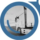 A view of a truck driving through the left lens of "YardView" blue binoculars.