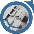 A view of paper products through the left side of "YardView" blue binoculars.