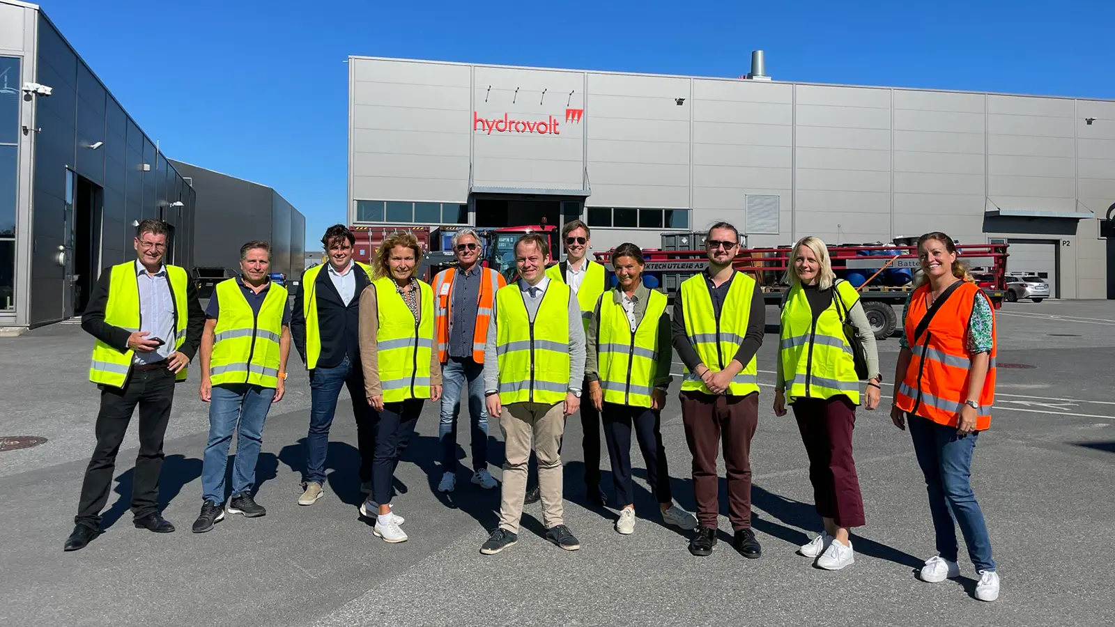 Group of people standing in front of Hydrobolt Plant