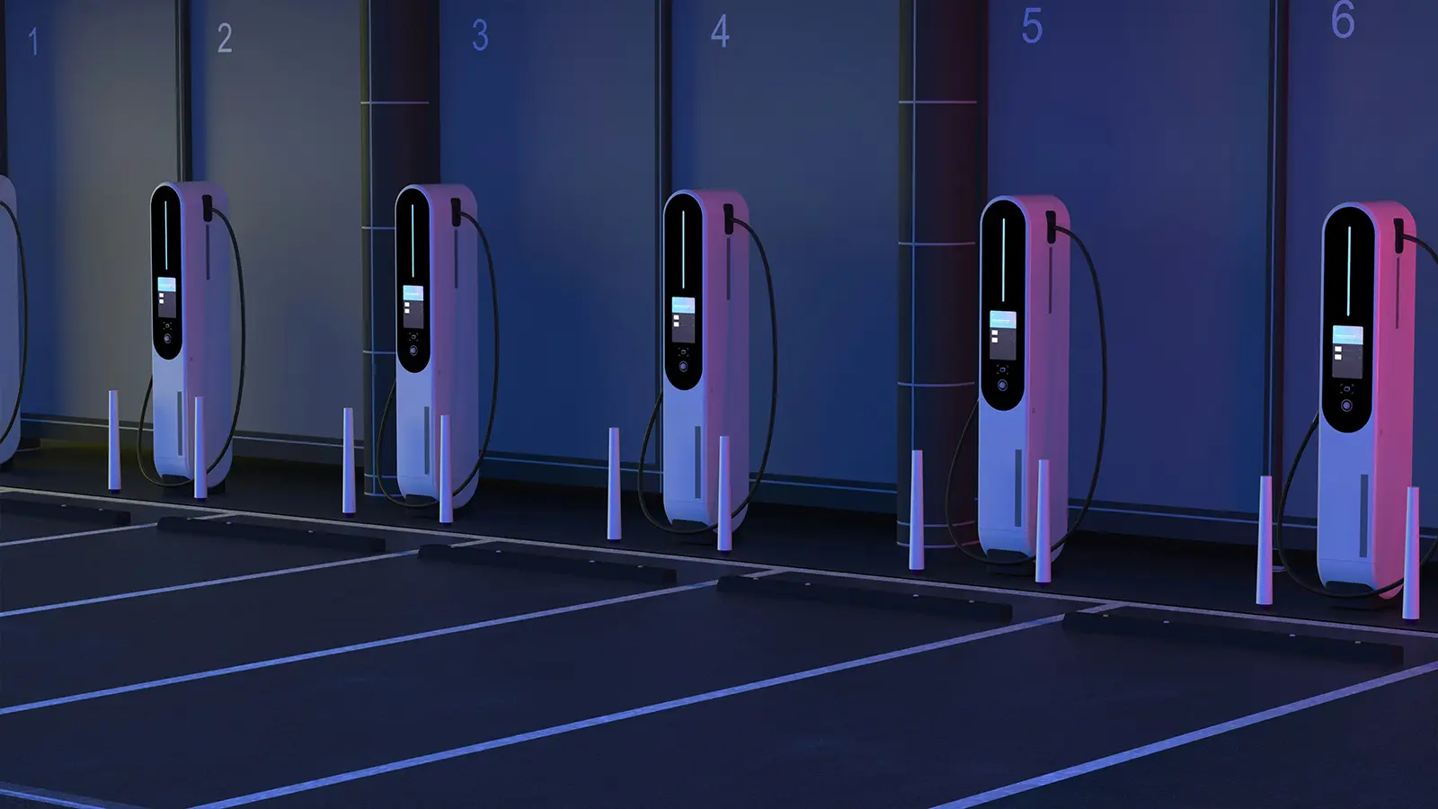 Una fila de estaciones de carga para vehículos eléctricos
