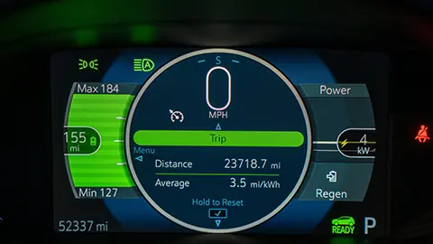 A EV car dashboard at night