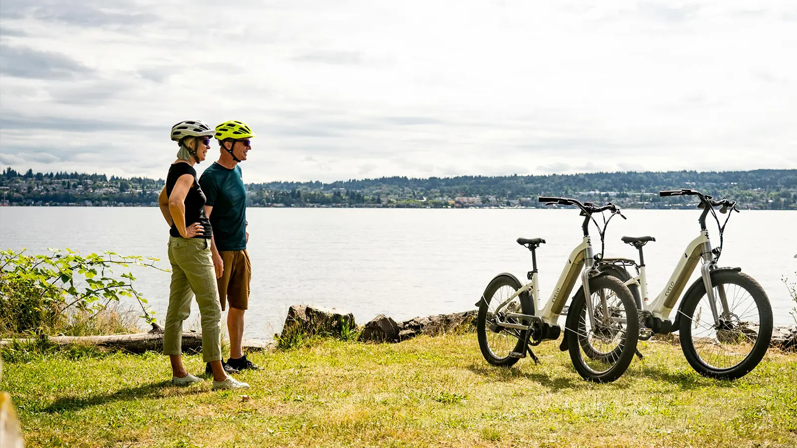 A couple looking at the view with two e-bikes
