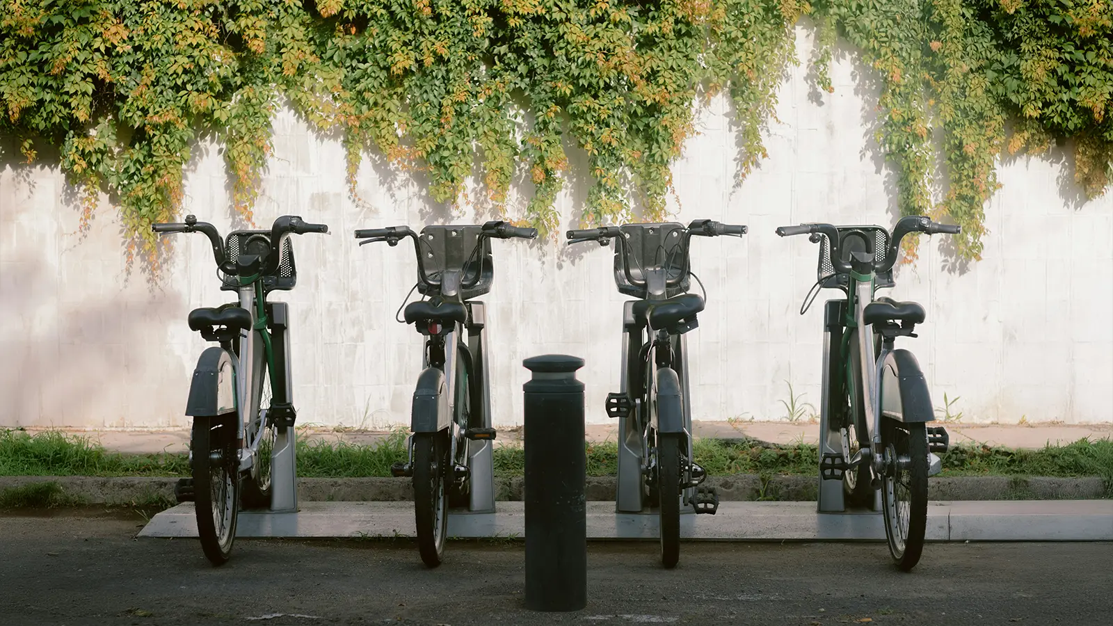 e-bikes charging on a rack
