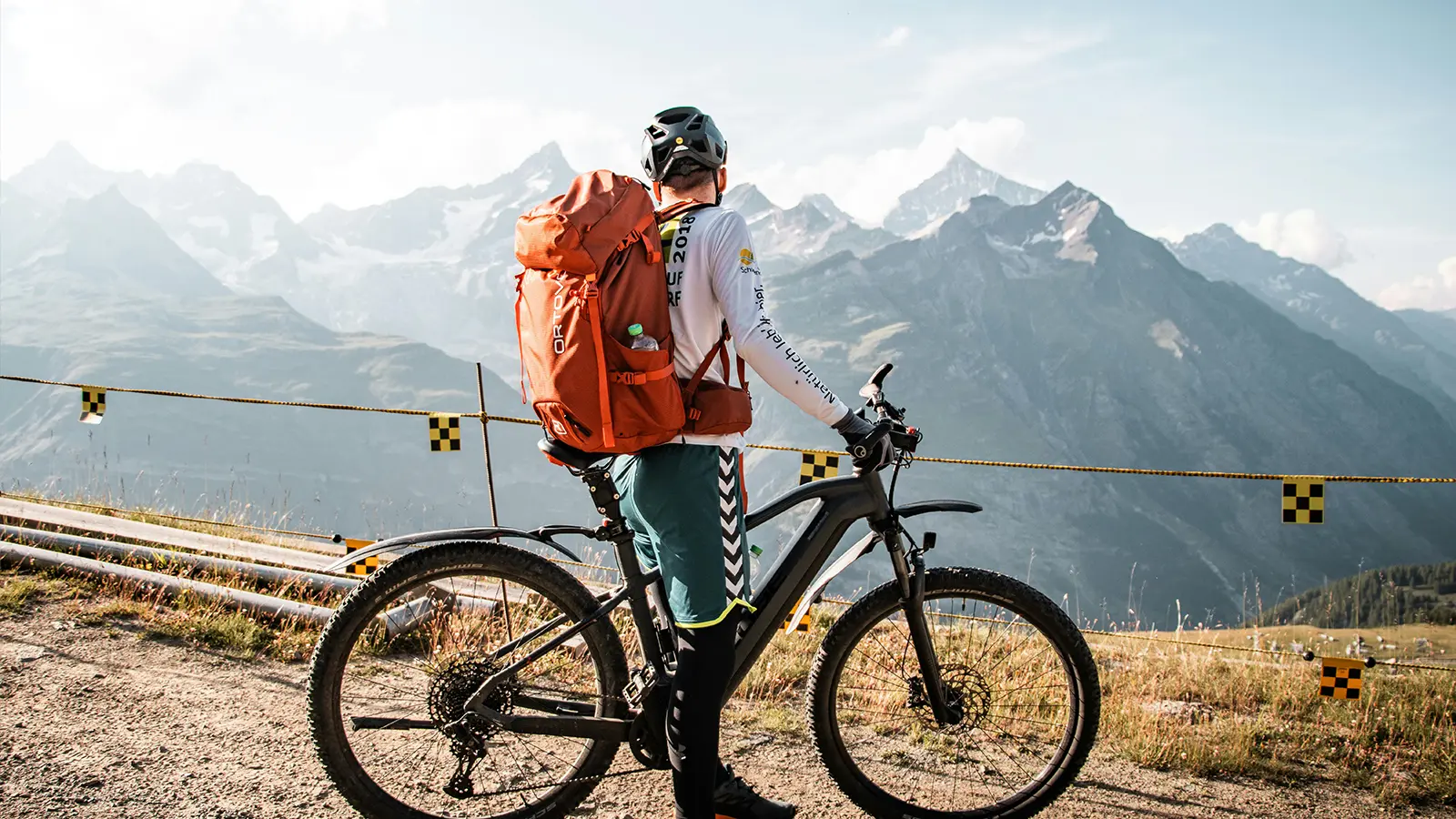 A e-bike rider on a mountain pass