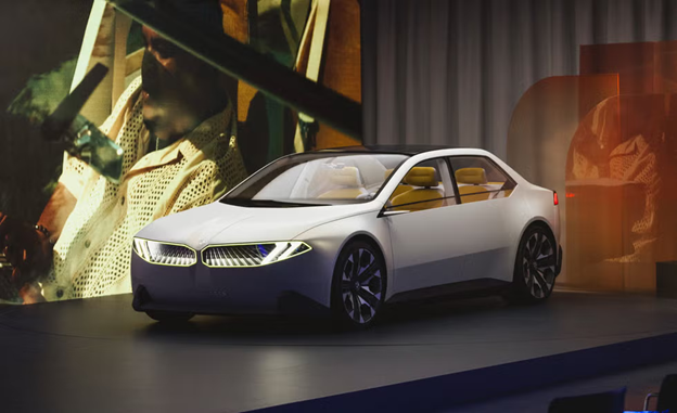 A white car on a stage