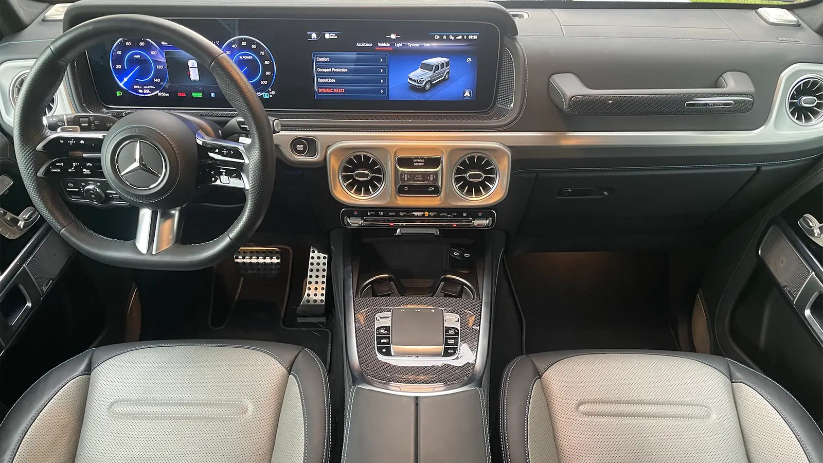 A white 2025 Mercedes Benz G 580 drivers view