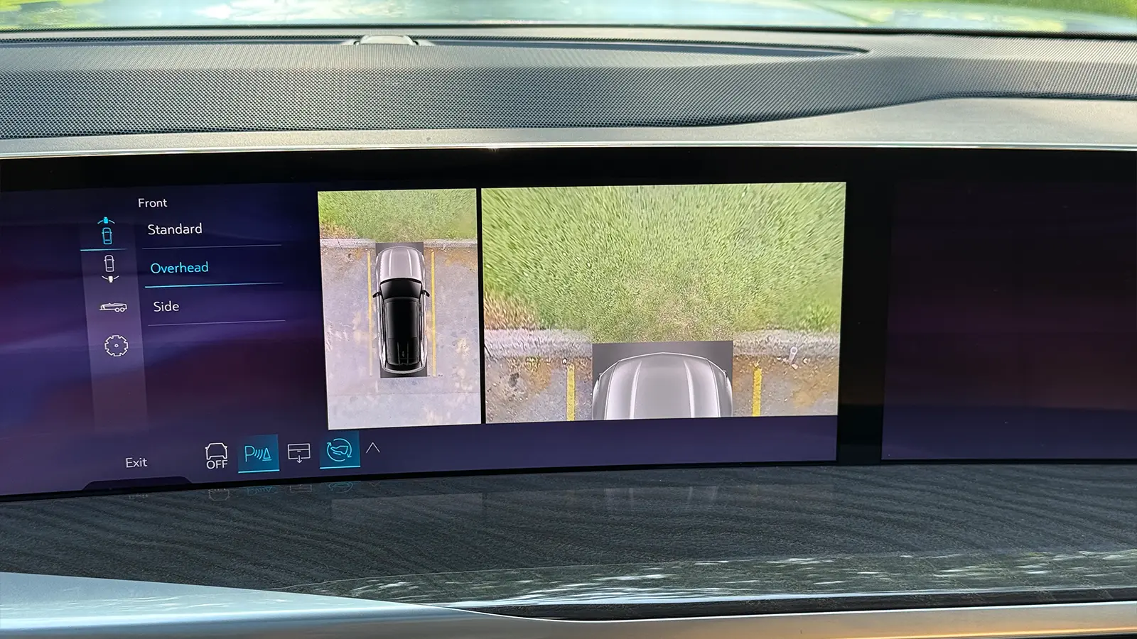 A light blue 2025 Cadillac Escalade IQ HUD