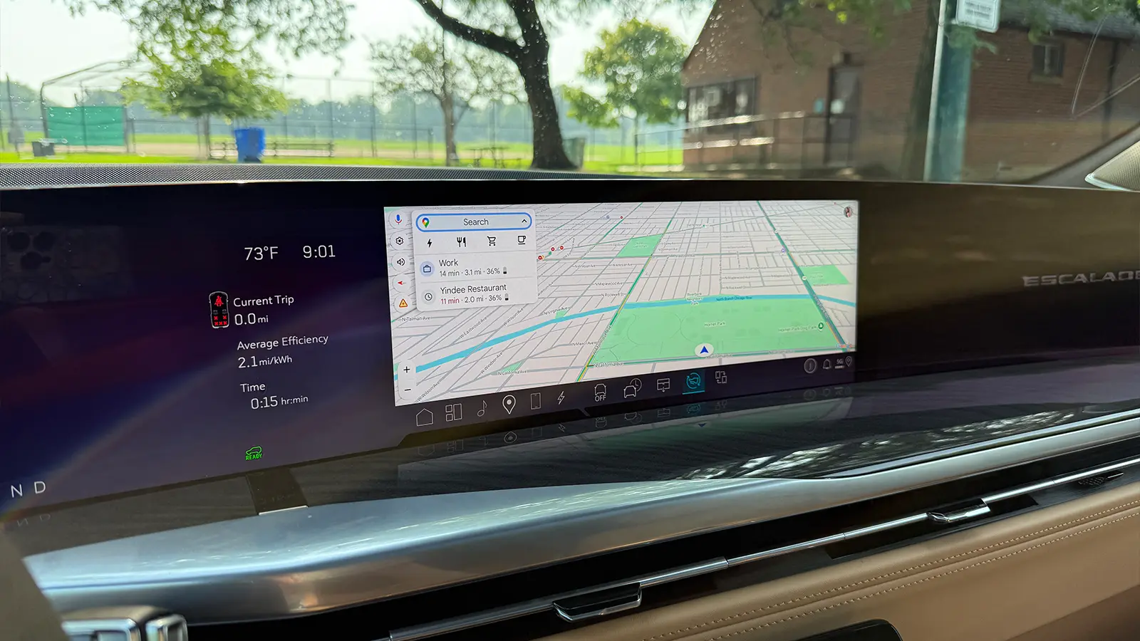 A light blue 2025 Cadillac Escalade IQ HUD navigation