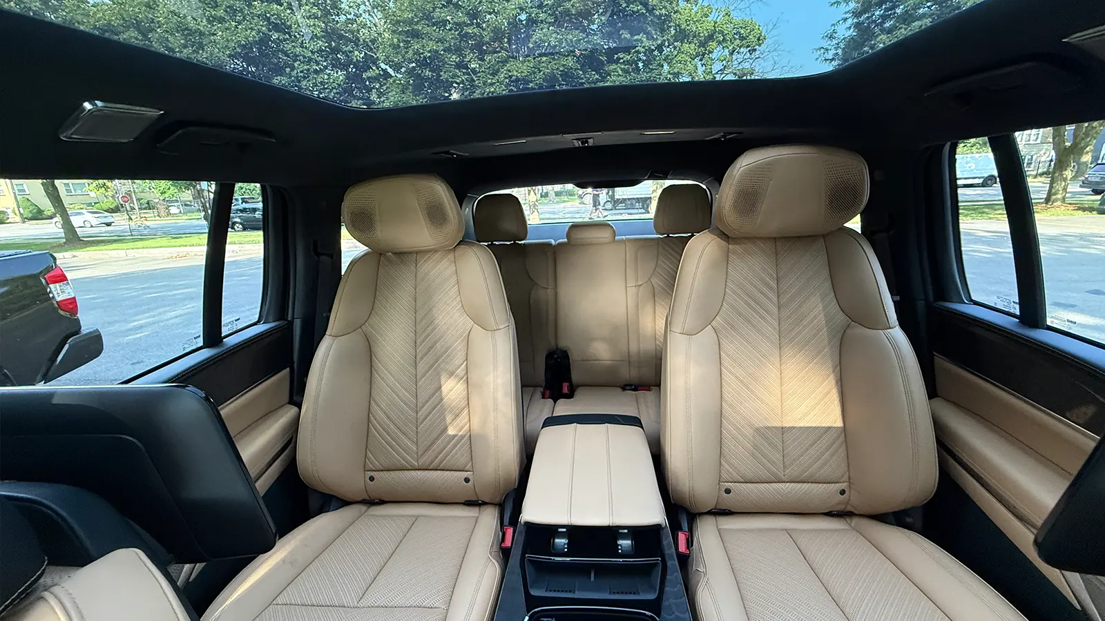 A light blue 2025 Cadillac Escalade IQ 3rd row seat