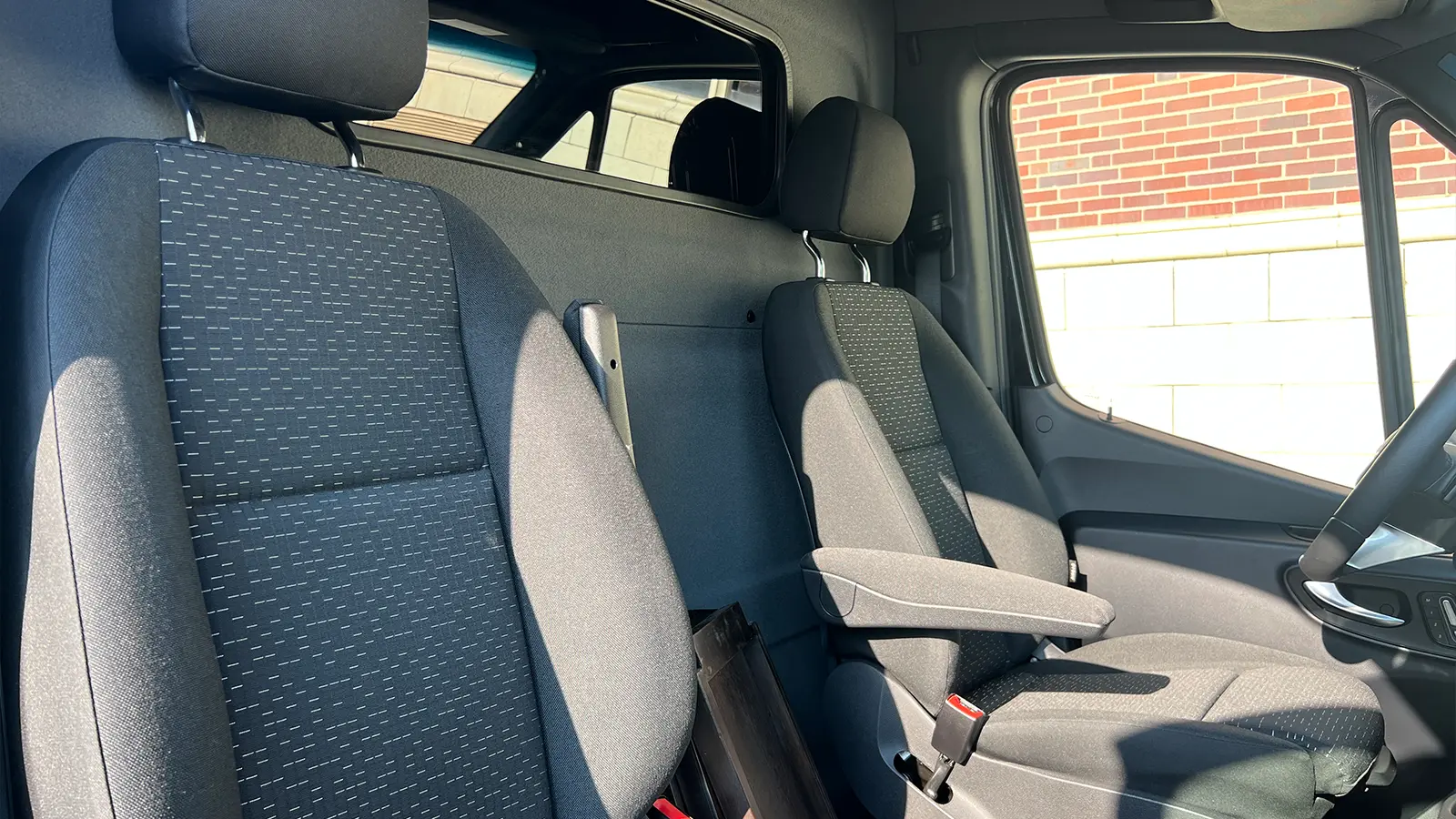 A black Mercedes eSprinter Cargo van front view
