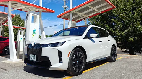 A white 2026 BMW iX xDrive60