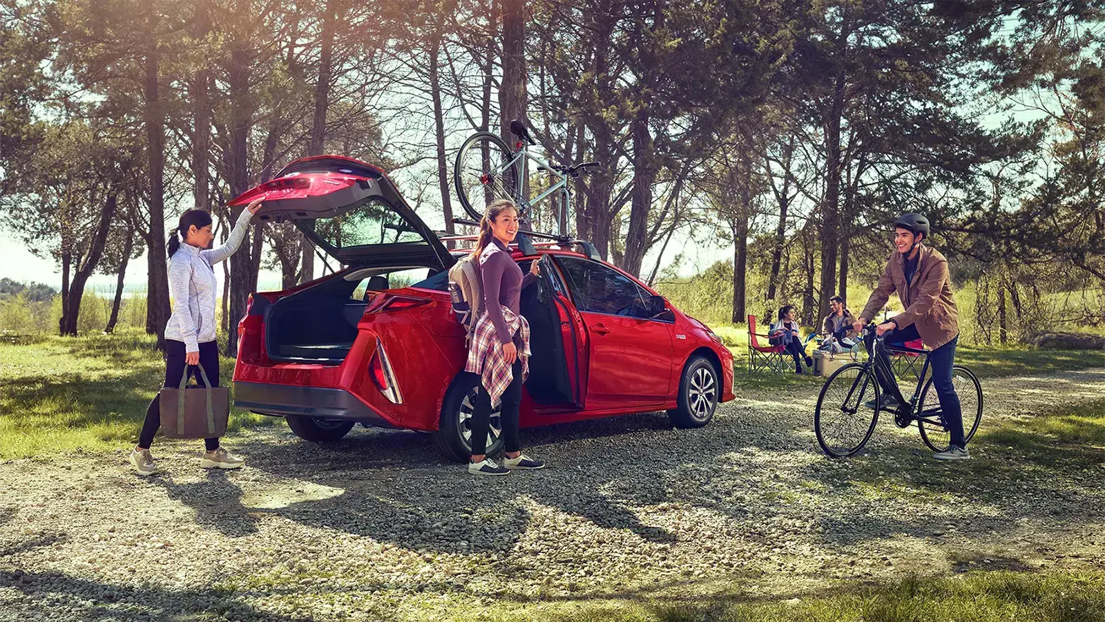 People outdoors with Hybrid Vehicle