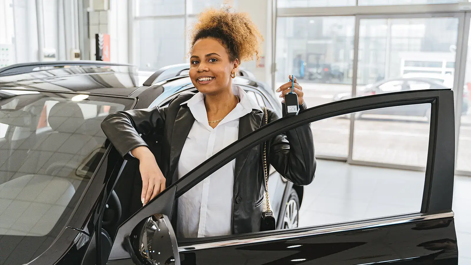Woman buying electric car