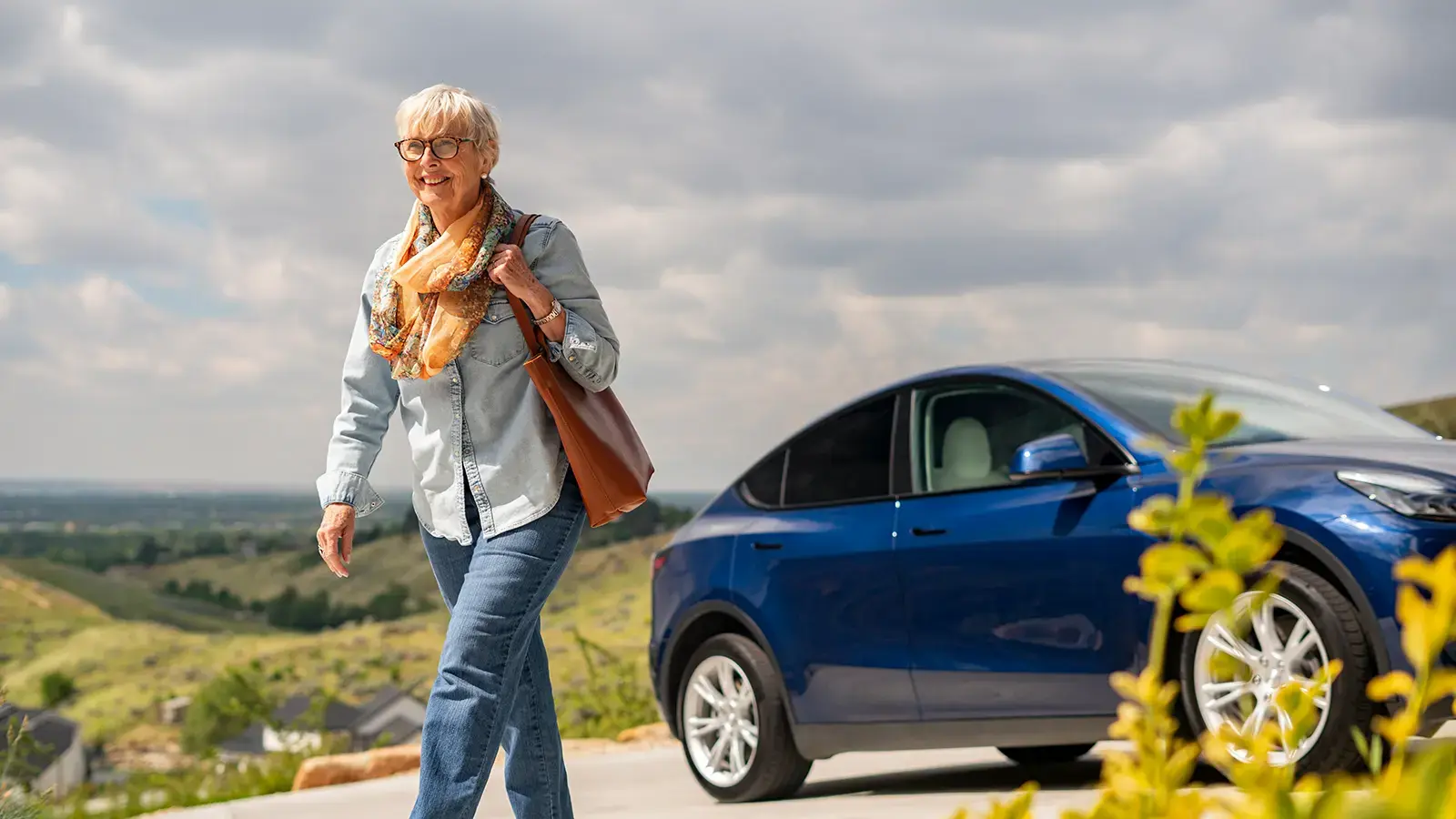Women walking away from an EV