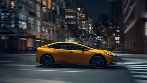 A yellow Toyota Prius