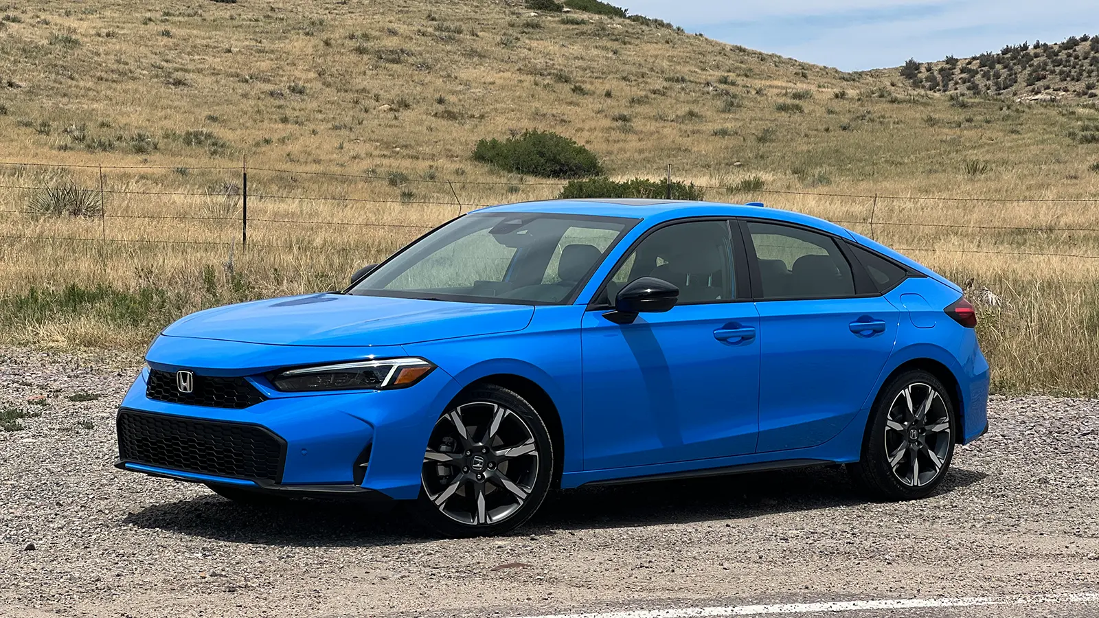 A blue 2025 Honda Civic Hatchback