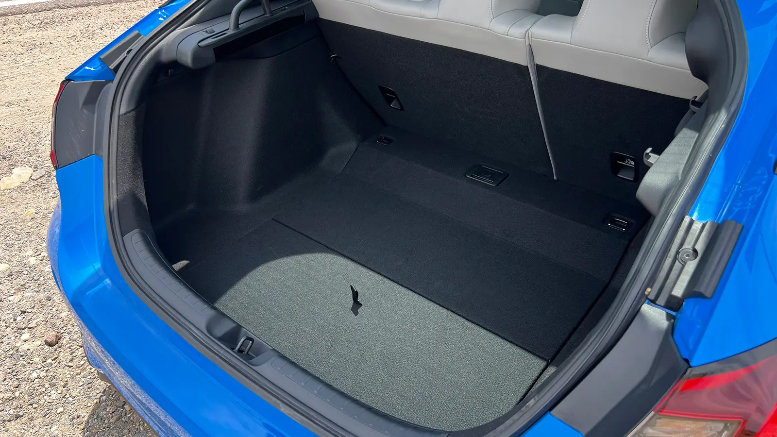A blue 2025 Honda Civic Hatchback drivers cargo bay view