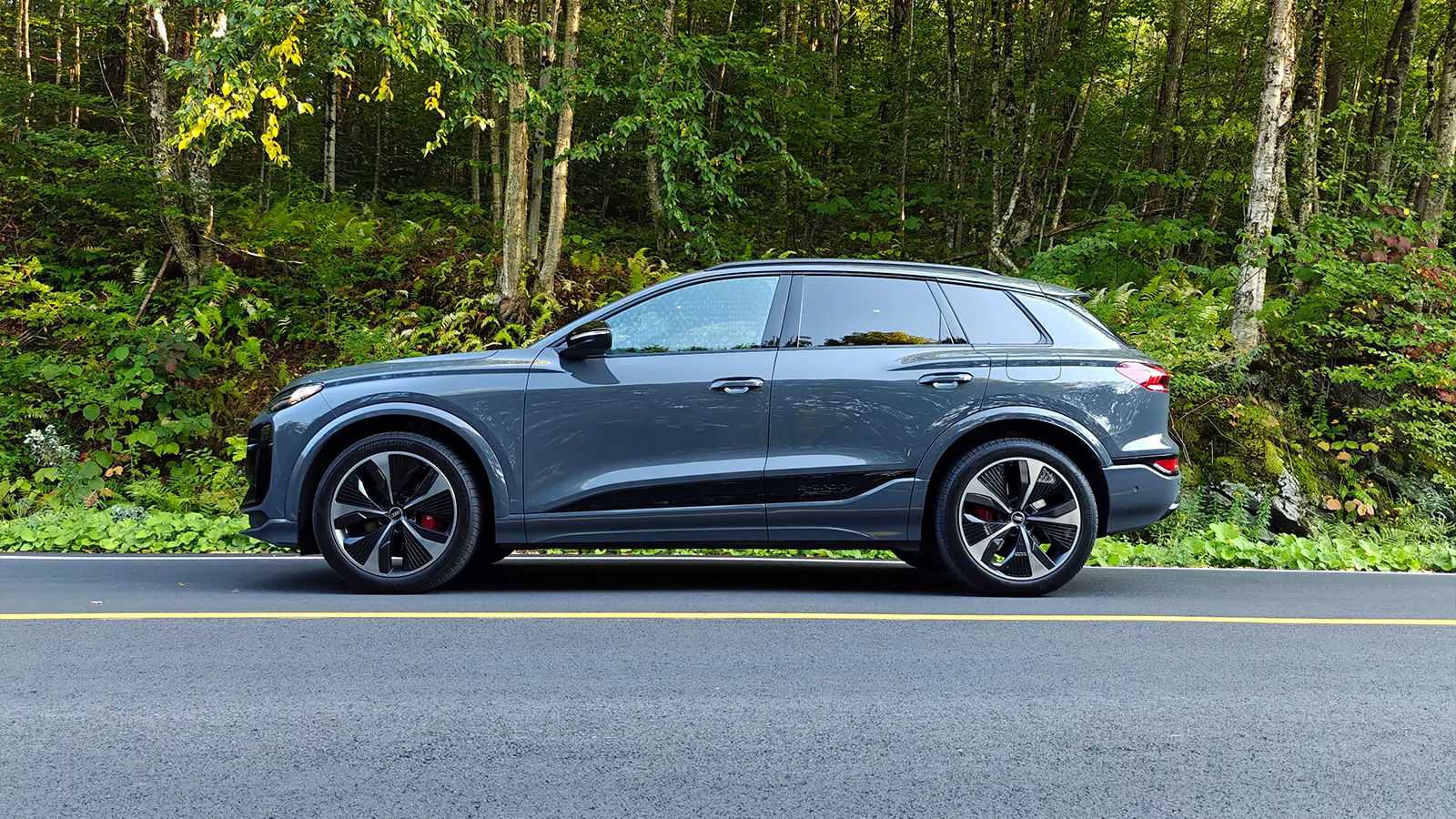 a 2025 Audi SQ6 e-tron side view