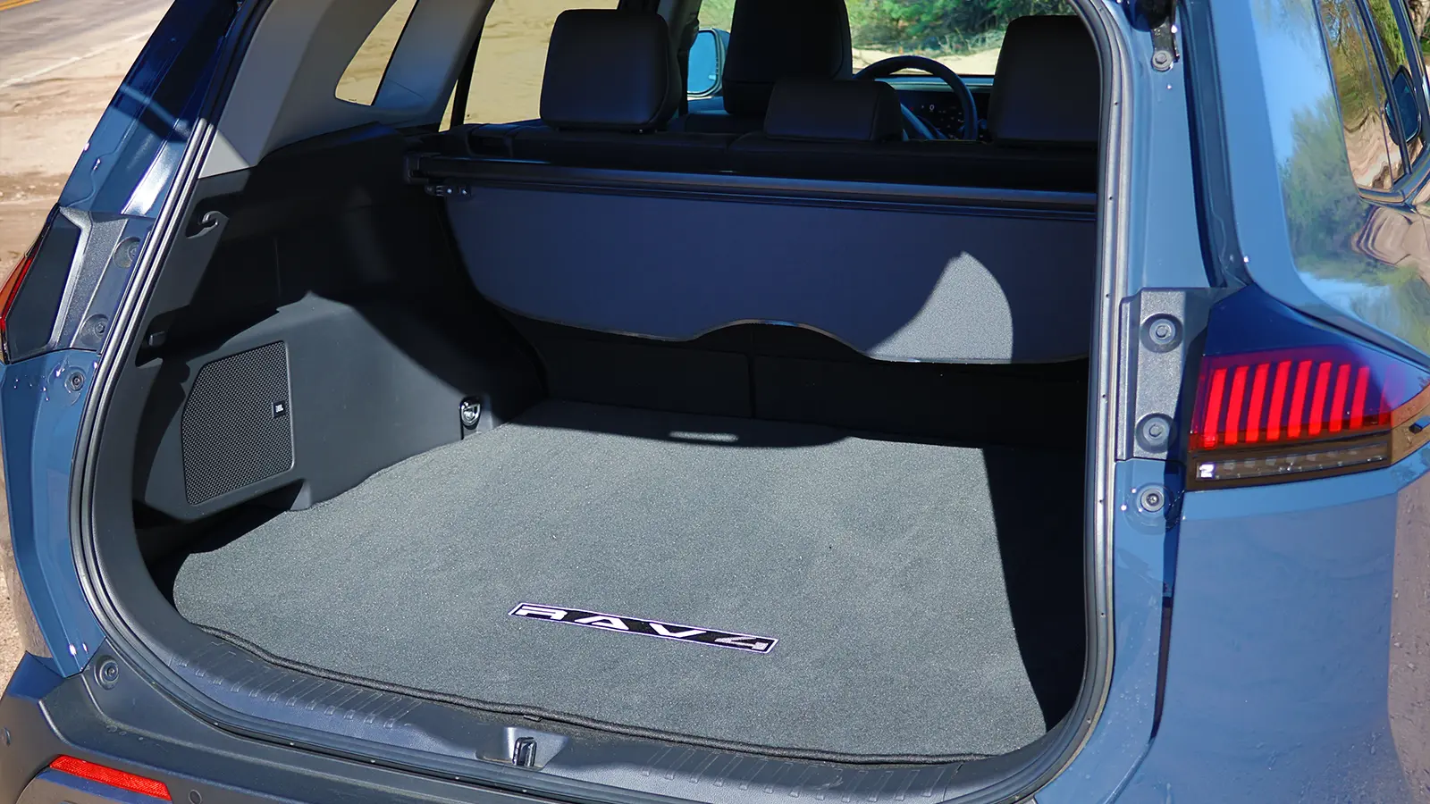 A gray 2026 Toyota Rav4 hybrid cargo bay