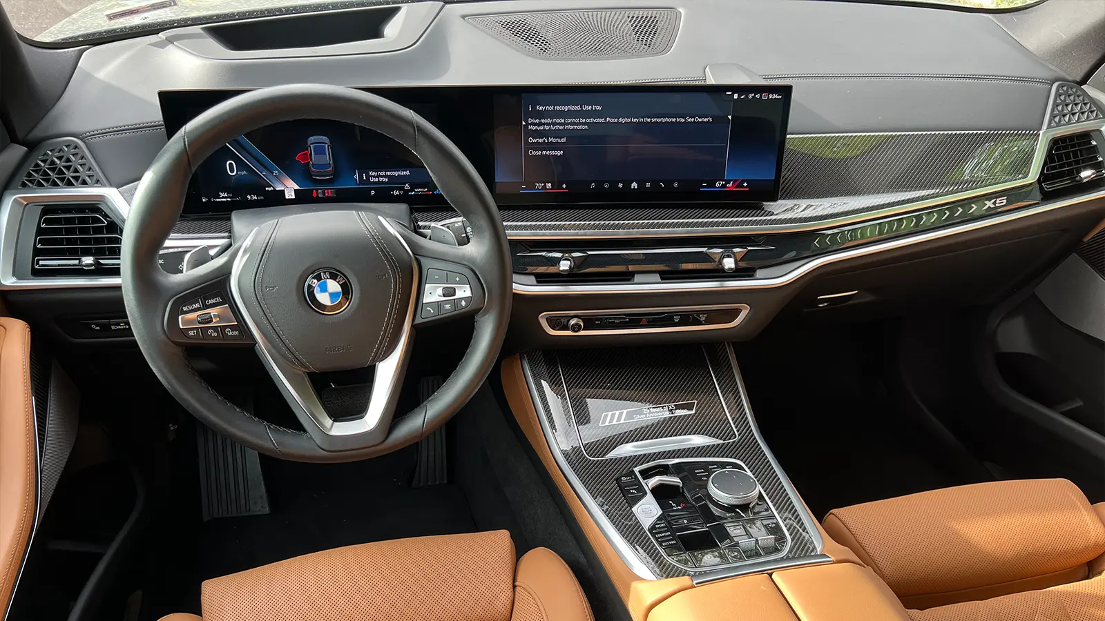 A grey 2025 BMW X5 drivers view