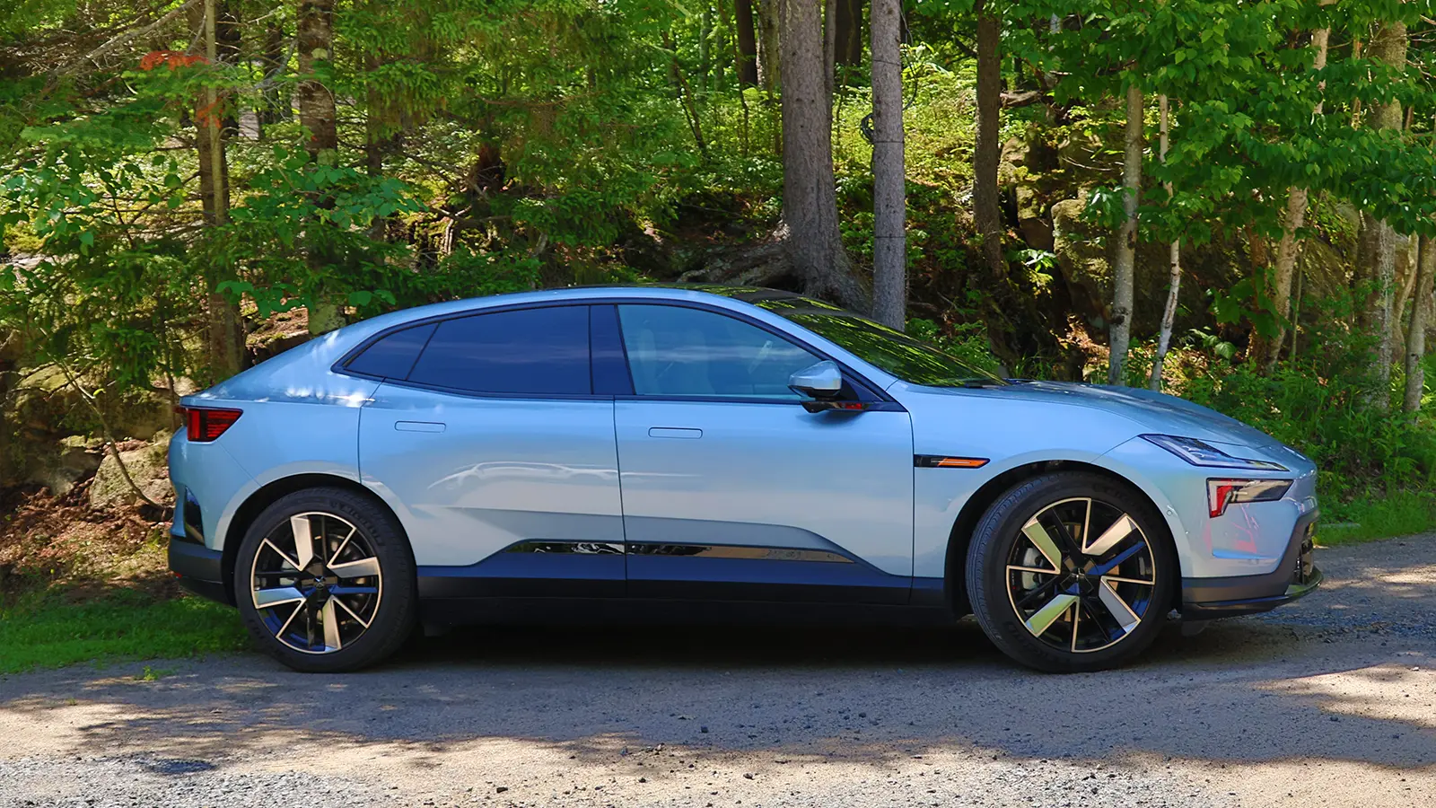 A silver 2025 Polestar 4 side view
