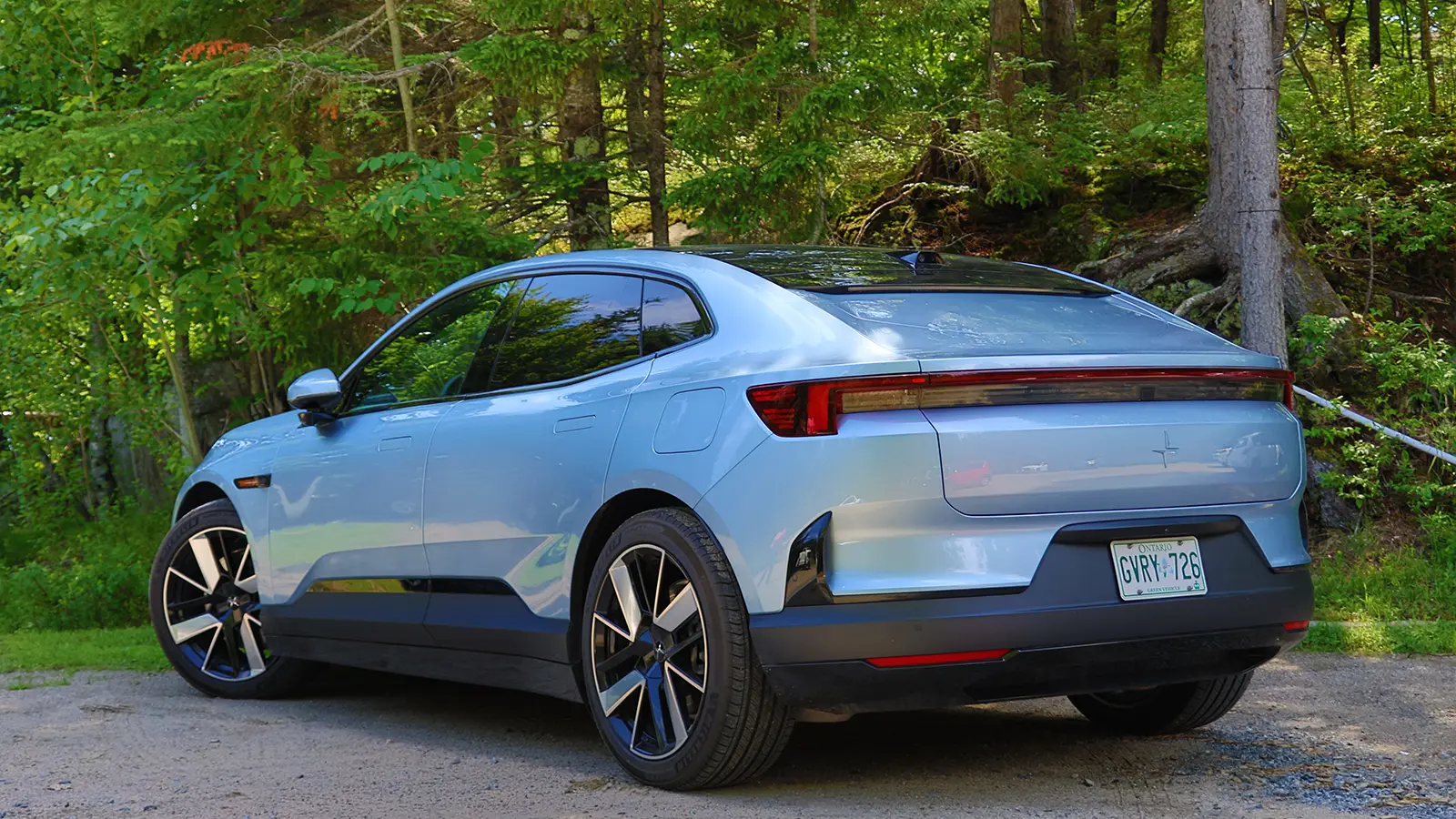 A silver 2025 Polestar 4 side view