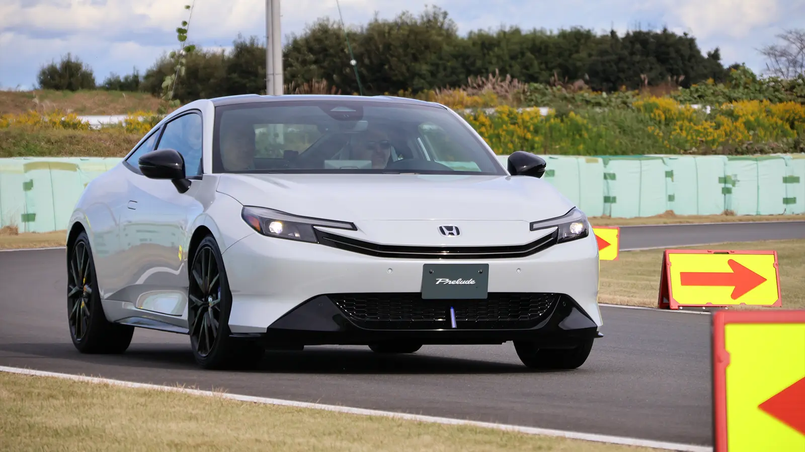 A white 2026 Honda Prelude on the track 