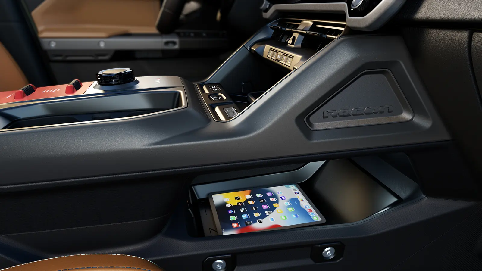 A 2026 Jeep Recon EV interior side console view