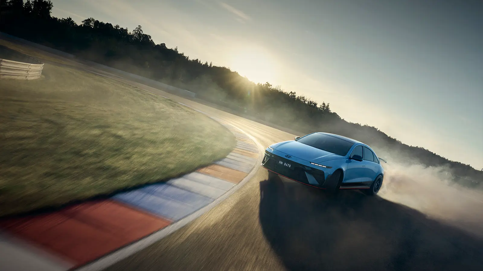 A blue 2026 Hyundai Ioniq 6 N on a track