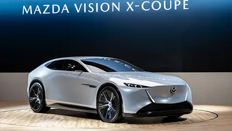 A silver Mazda Vision-X Coupe