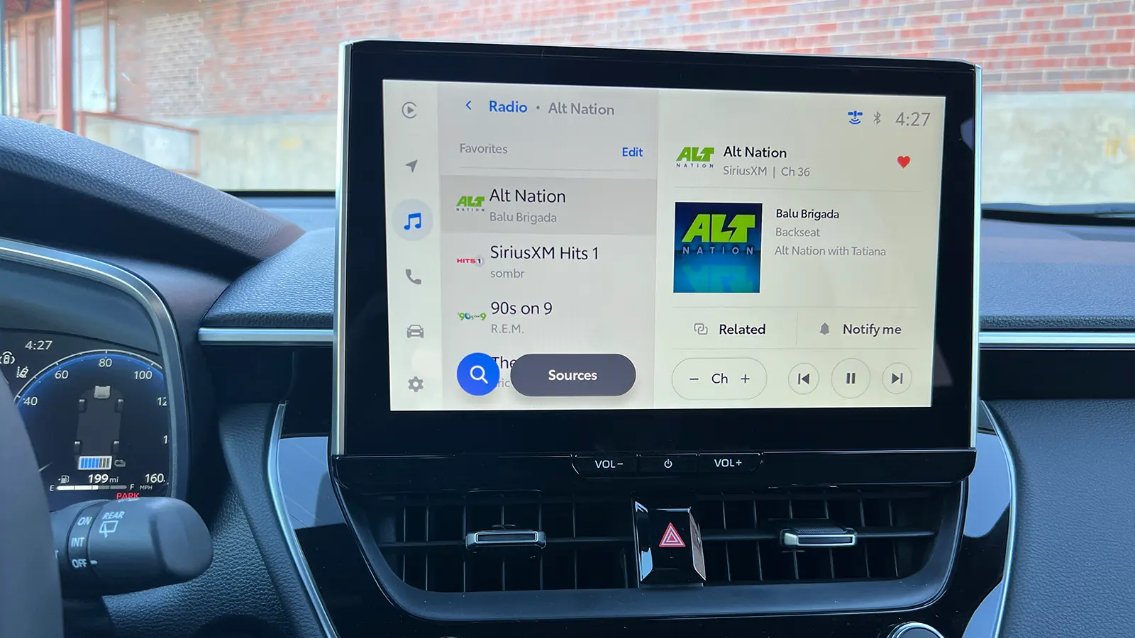 A blue 2026 Toyota Corolla Cross hybrid HUD view