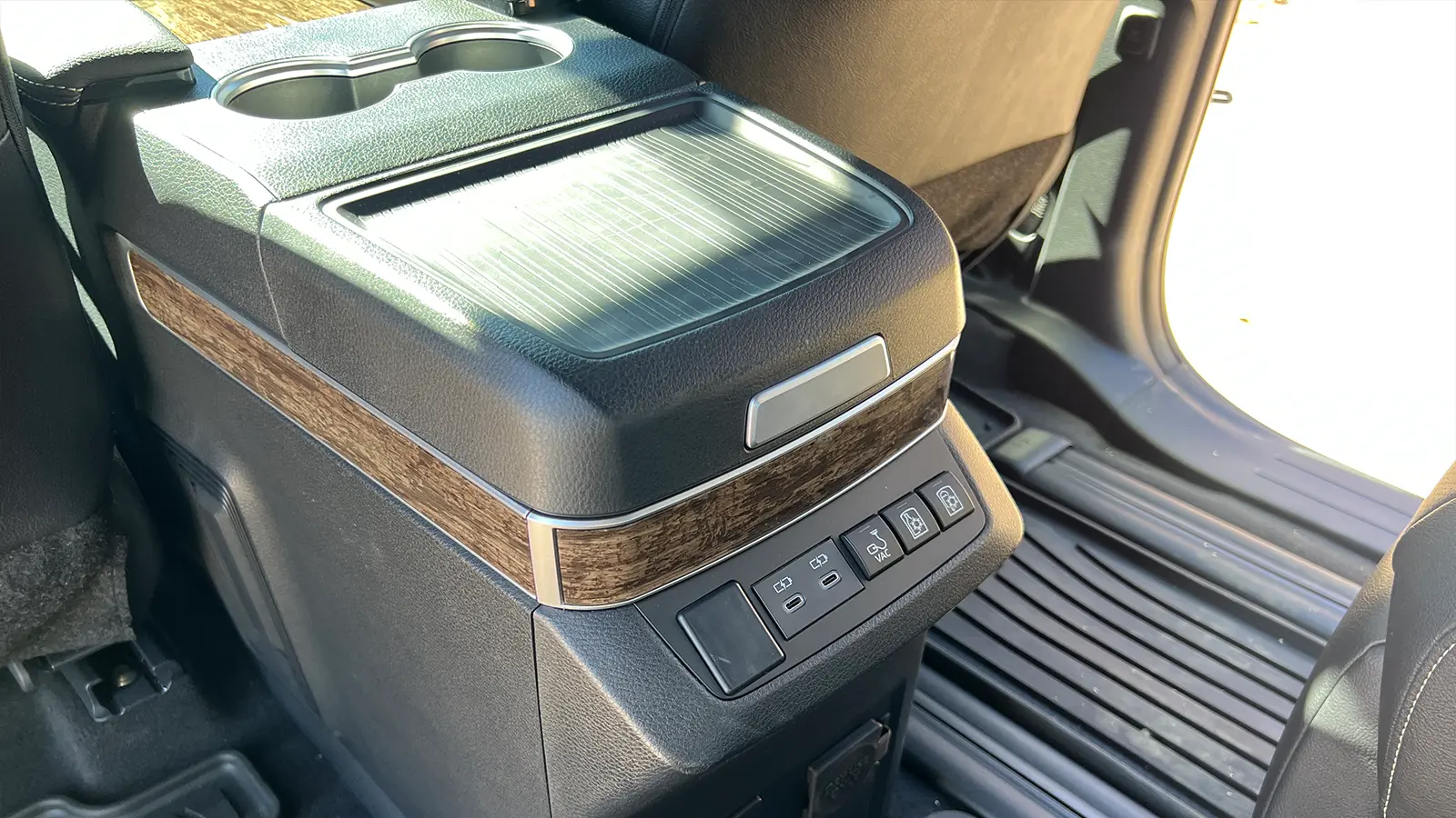 A 2025 Toyota Sienna Hybrid Platinum AWD rear center console