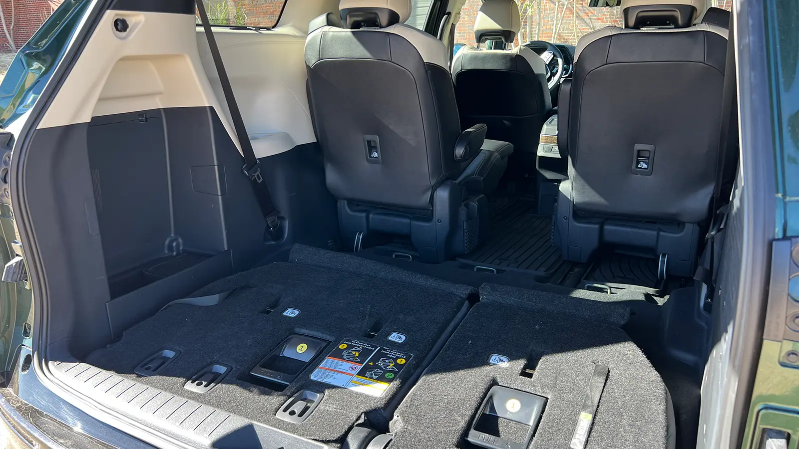 A 2025 Toyota Sienna Hybrid Platinum AWD 3rd seat down