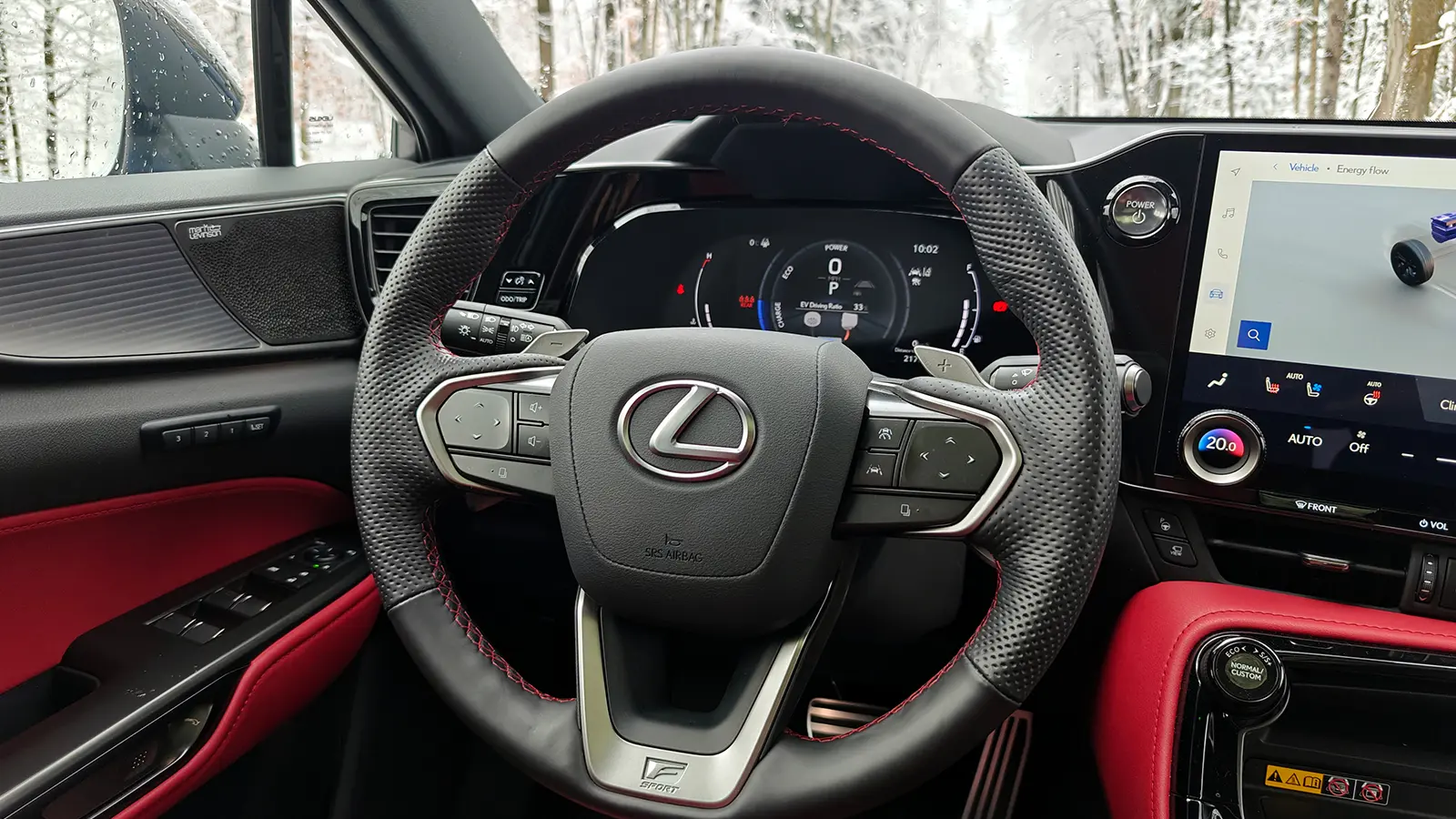 A 2026 Lexus NX 350h F Sport driver side view close up