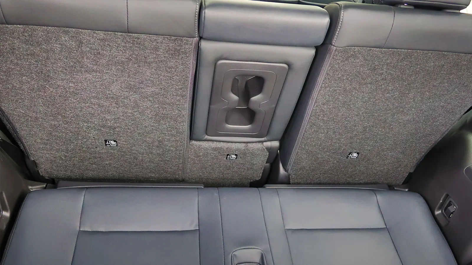 A red 2026 Nissan Rogue 3rd row seat