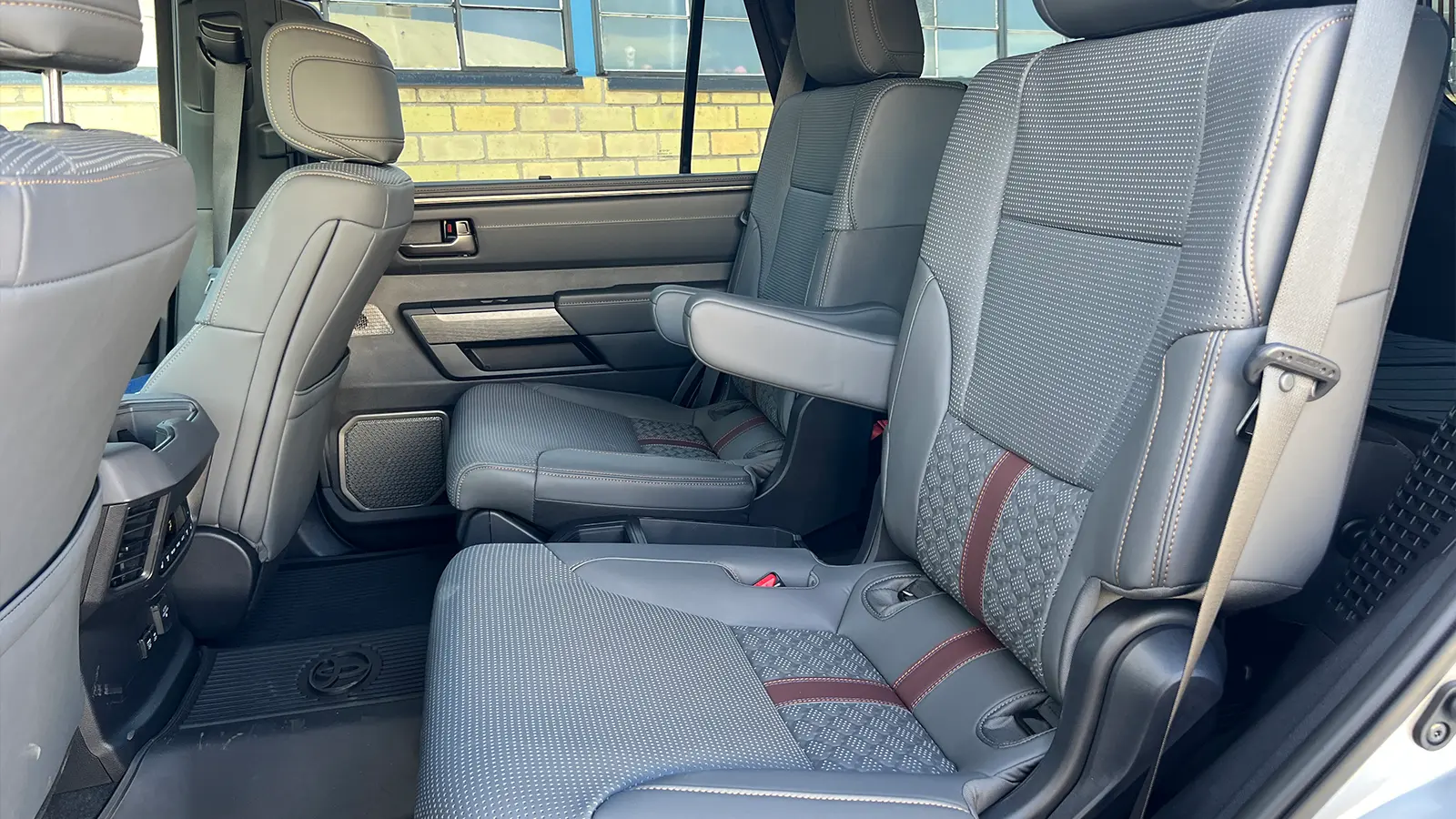 A silver 2026 Toyota Sequoia Hybrid Capstone rear view