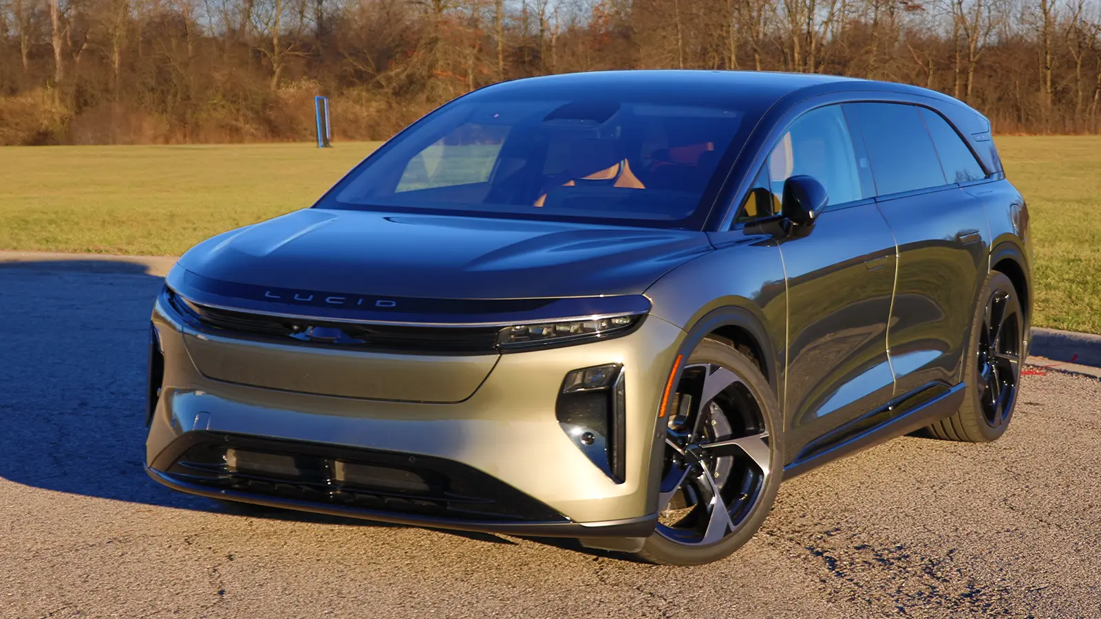 A dark gray lucid gravity in a clear field on crisp winter day