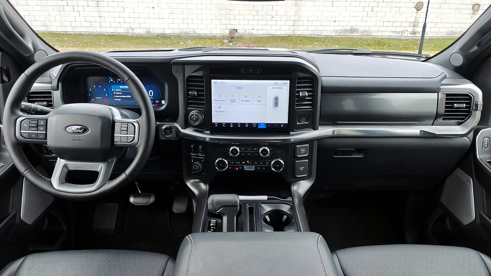 2025 Ford F-150 Powerboost Lariat driver front interior view