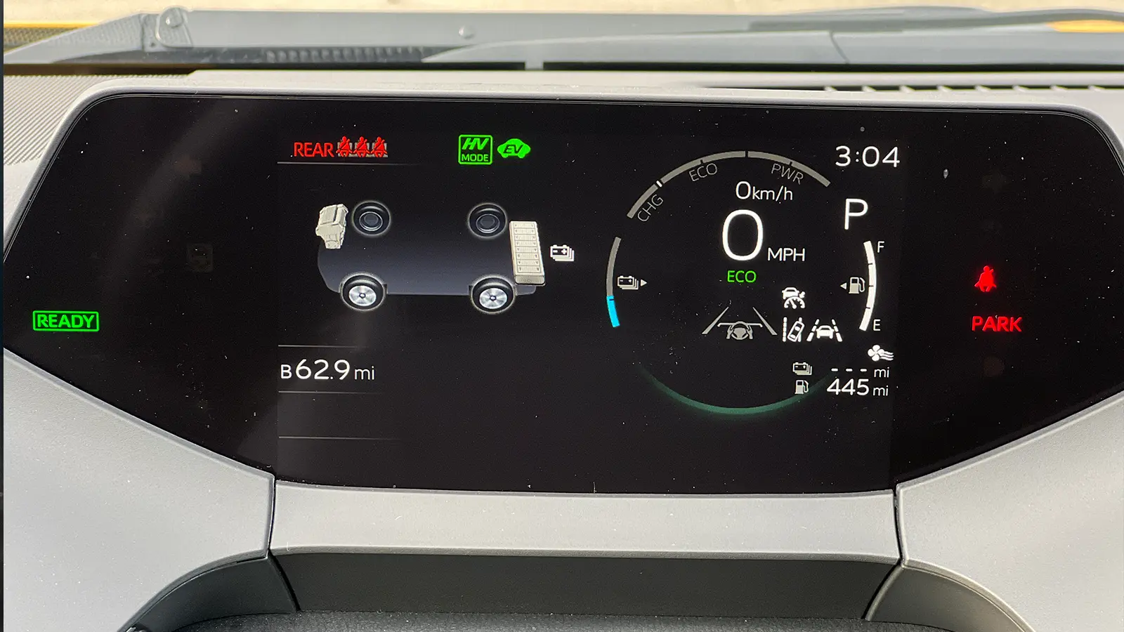 A yellow 2026 Toyota Prius XSE PHEV Nightshade driver Speedometer HUD