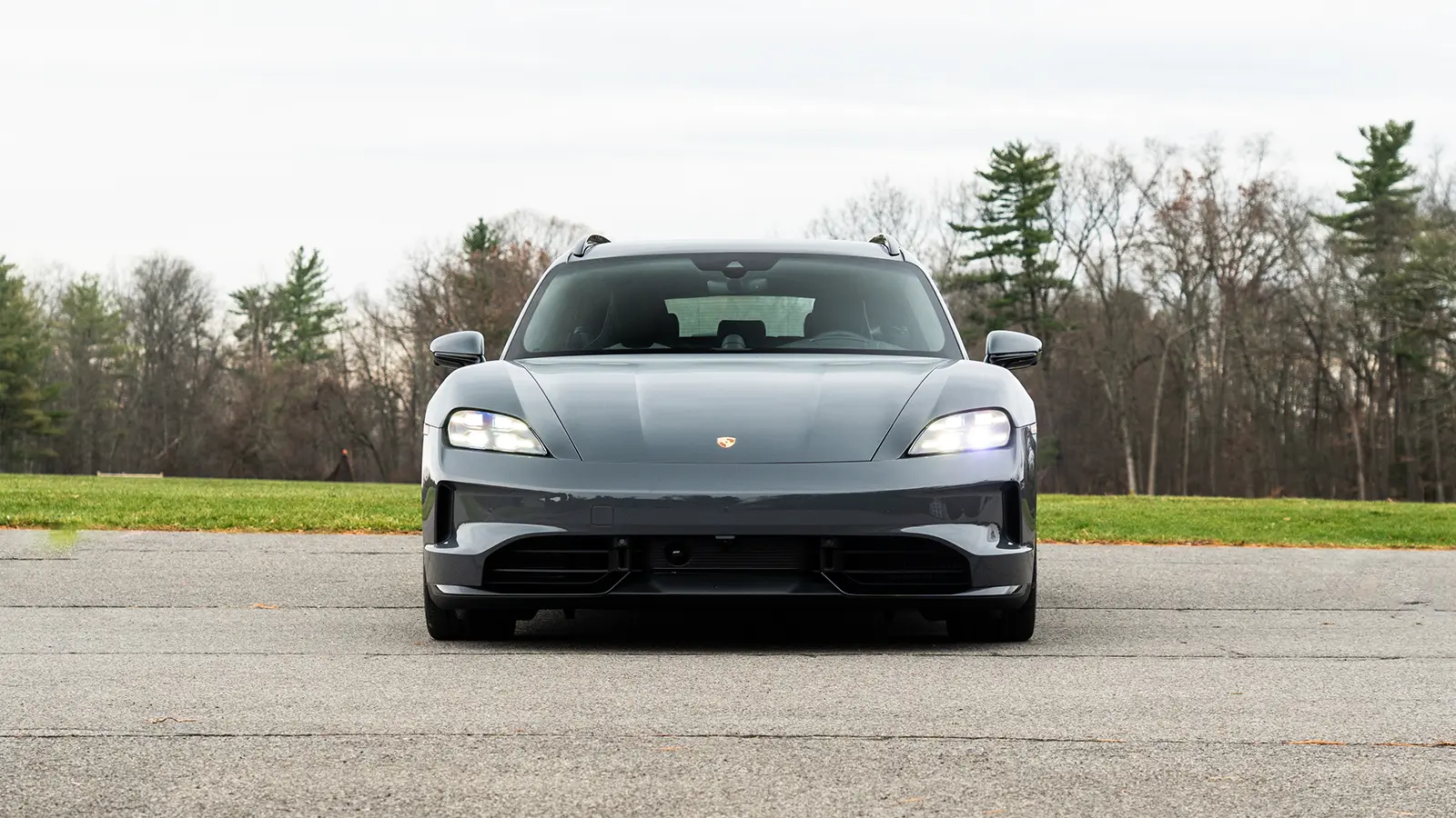 A dark gray 2025 Porsche Taycan GTS-3 front view