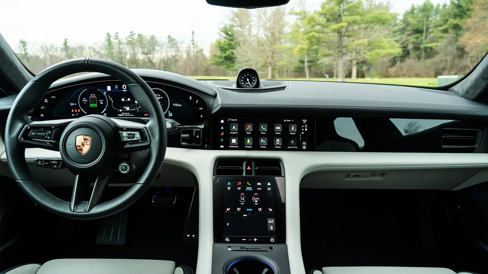 A dark gray 2025 Porsche Taycan GTS-3 driver front view