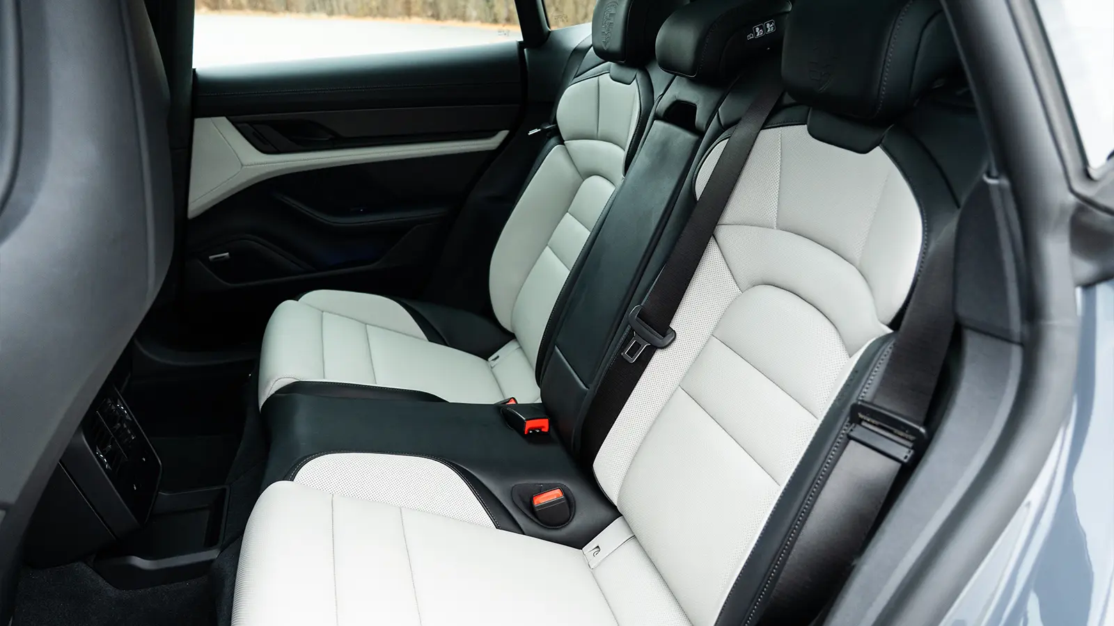 A dark gray 2025 Porsche Taycan GTS-3 rear seats