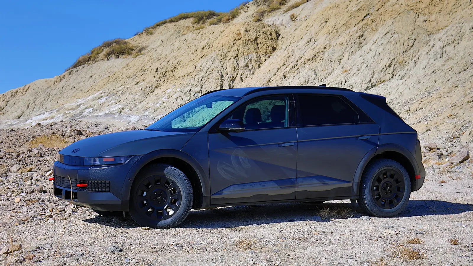 A black 2025 Hyundai 5 XRT in the desert side view