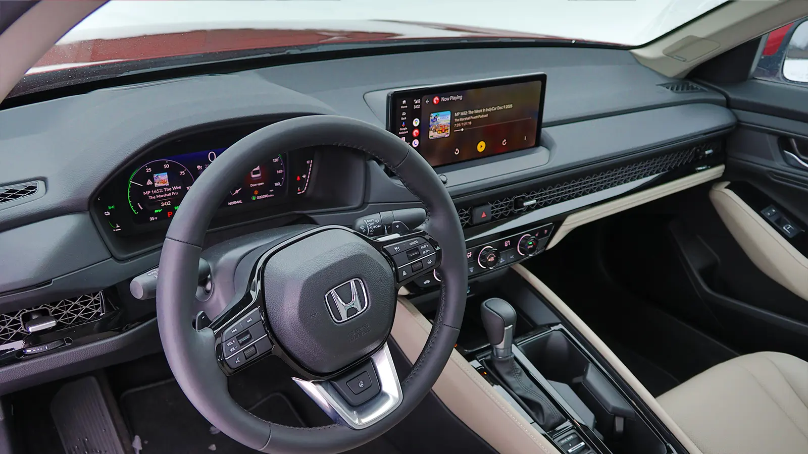 A red 2026 Honda Accord Hybrid's drivers side front view HUD