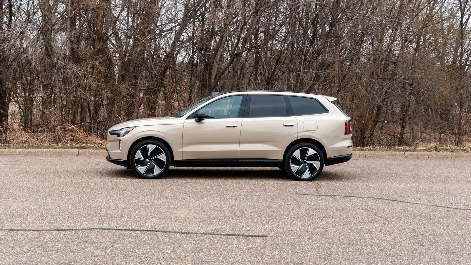 A silver 2025 Volvo EX90 front side view