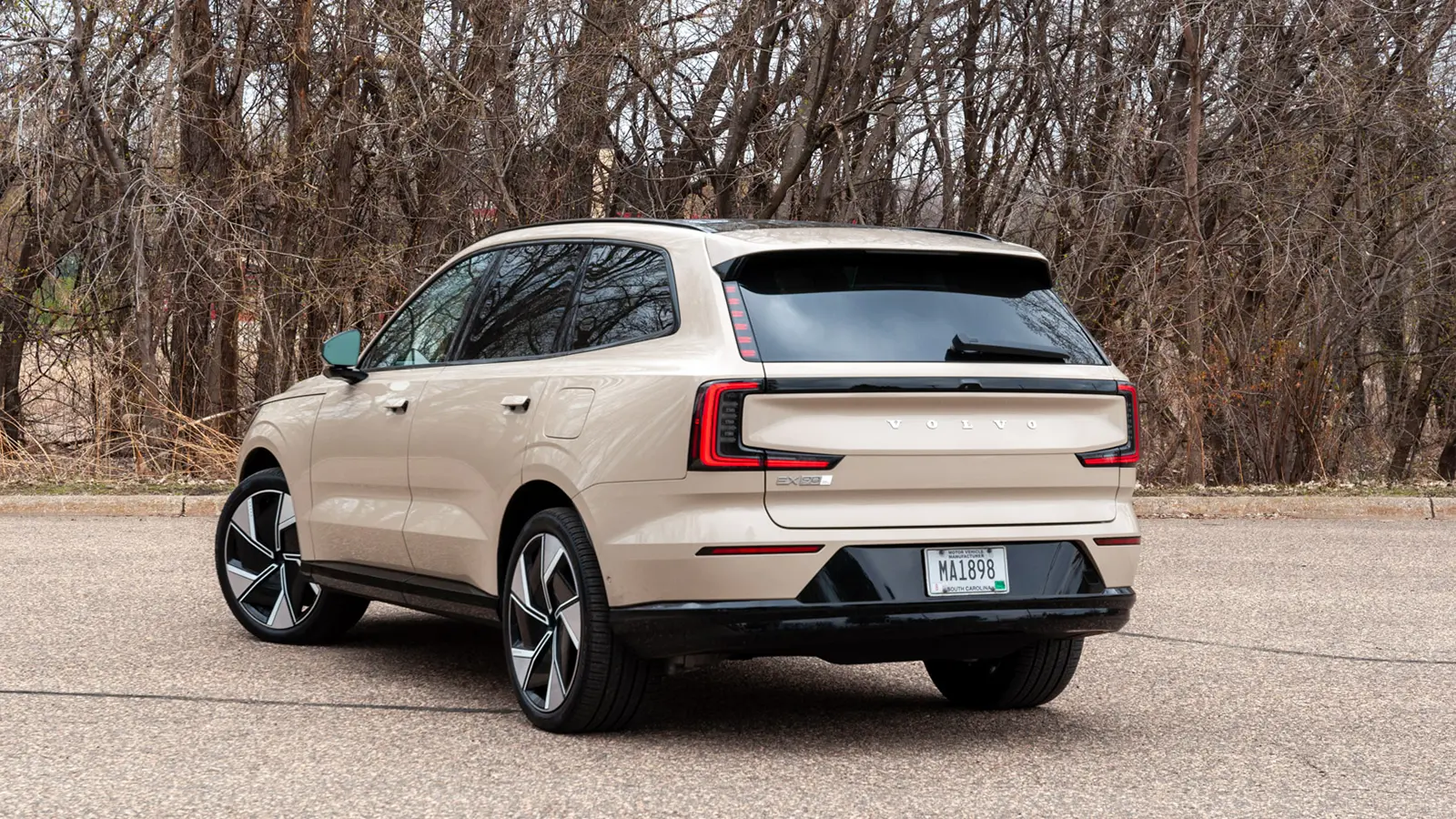 A silver 2025 Volvo EX90 front rear three quarter view