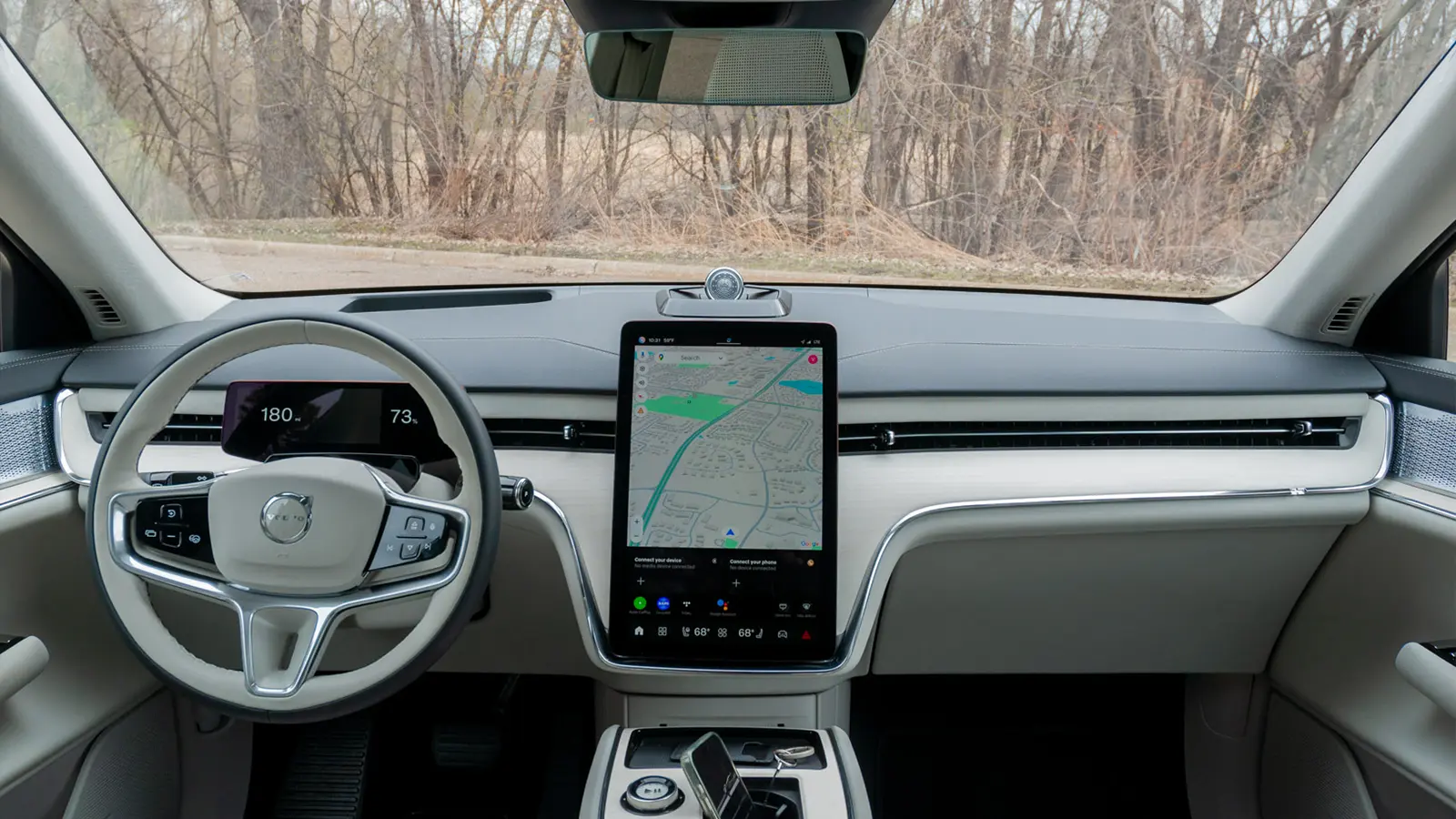 A silver 2025 Volvo EX90 driver HUD view