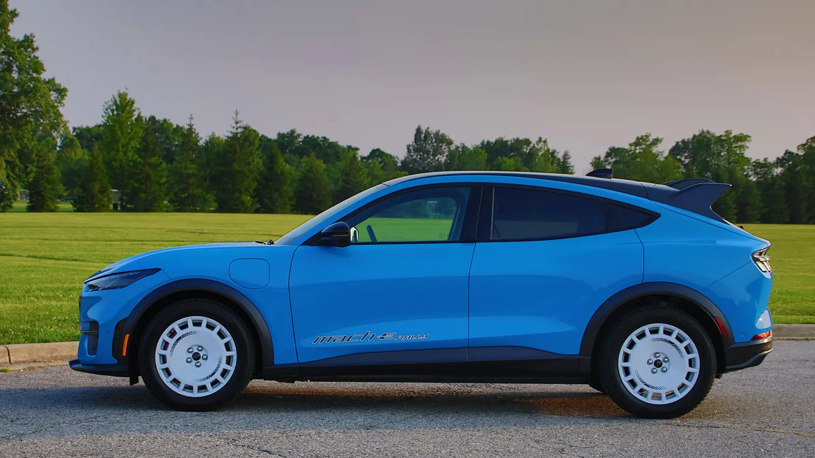 A blue 2026 Ford Mustang Mach-E side profile
