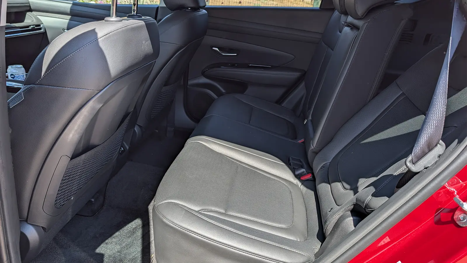 A light blue 2026 Hyundai Tucson Hybrid interior rear second row seats