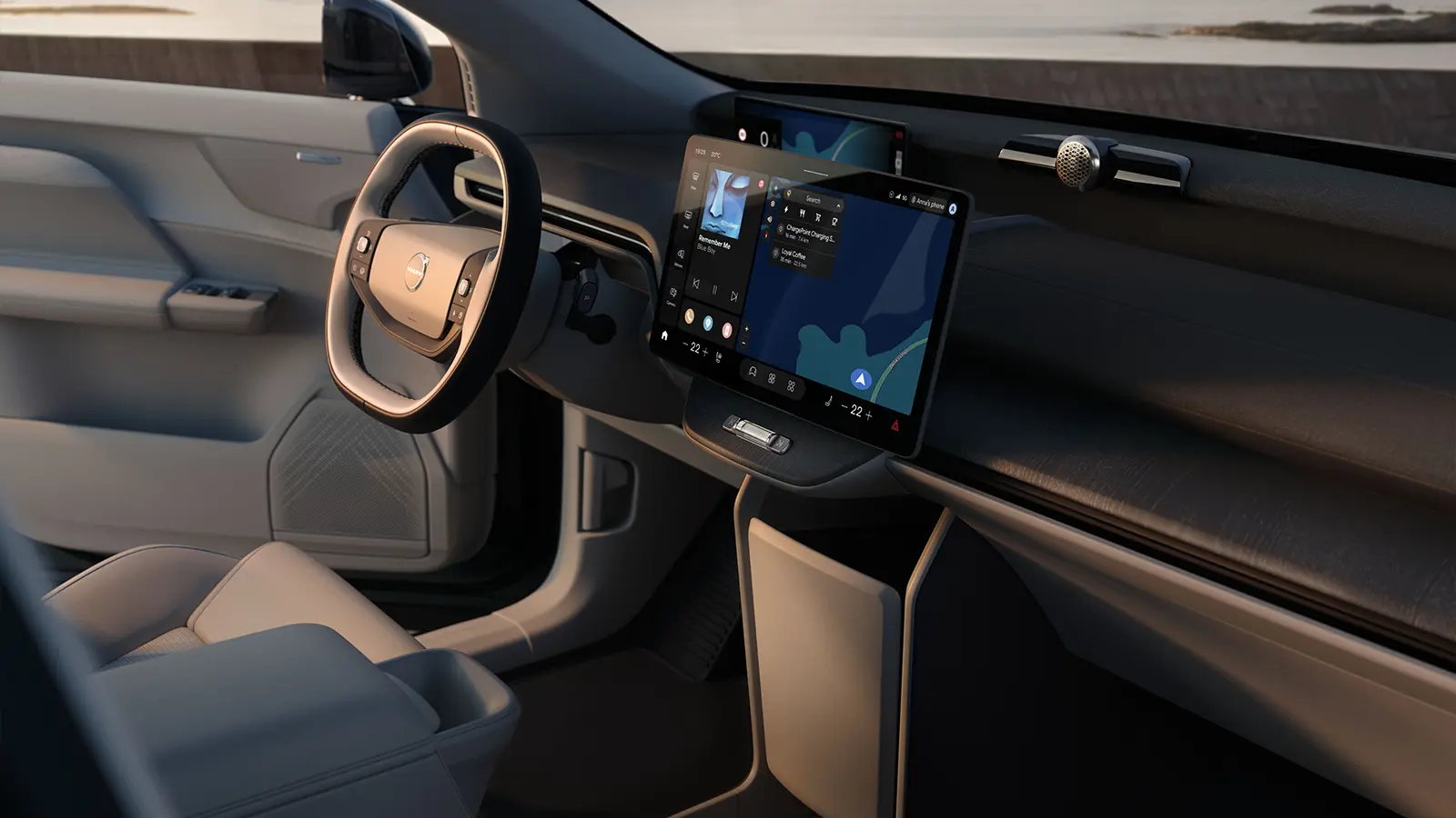 A dark gray 2027 Volvo EX60 driver interior side view